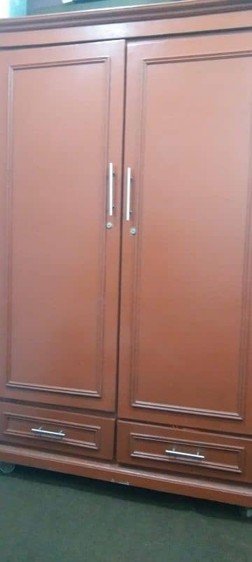 wardrobe hard wood  3 months used like new 1