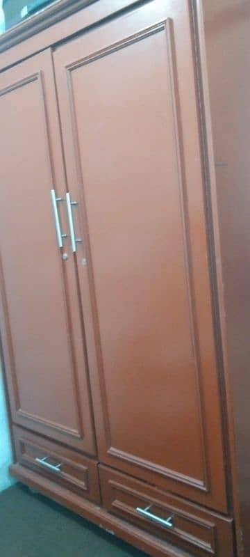 wardrobe hard wood  3 months used like new 3