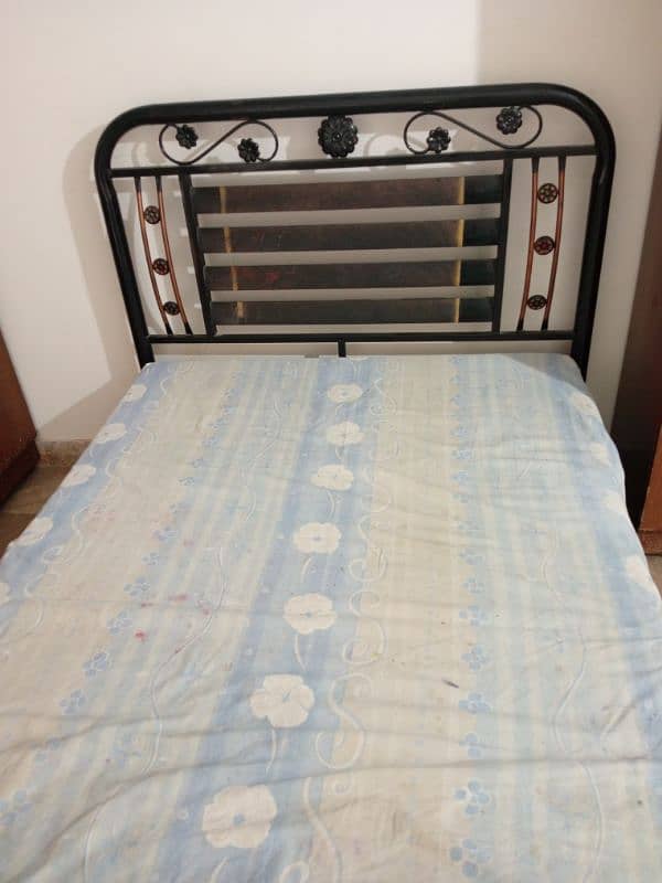 Iron queen size bed 1