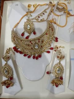 red golden heavy jewelry