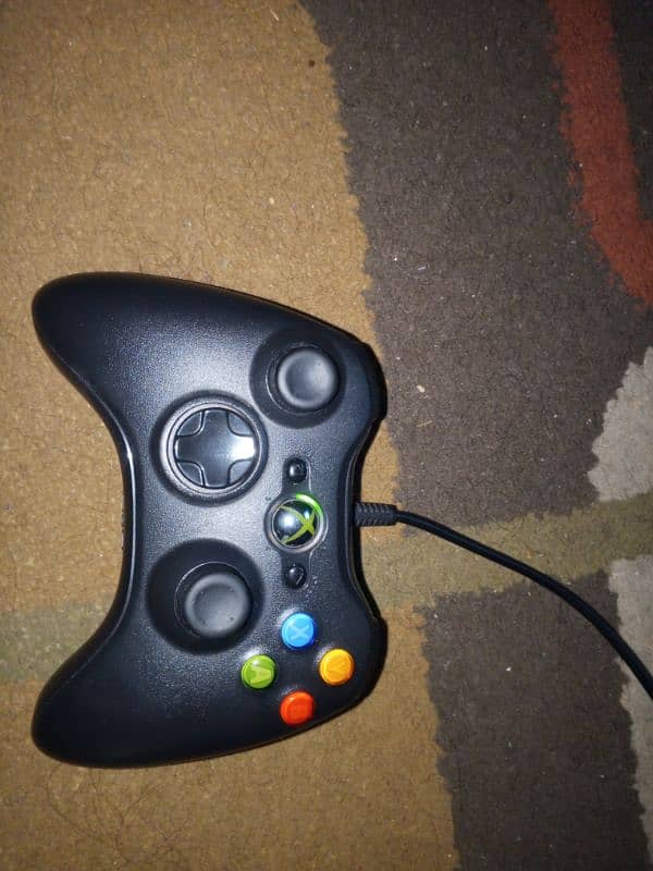 Xbox 360 with 21 games 1st hand price negotiable 8