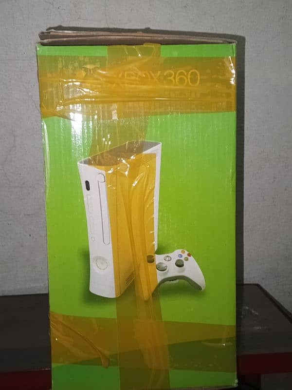 Xbox 360 with 21 games 1st hand price negotiable 18