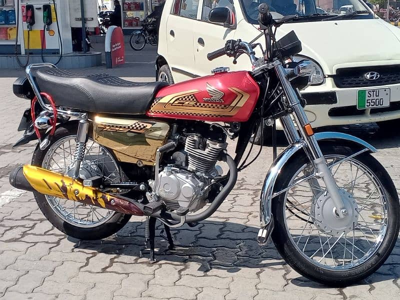 Honda 125 gold edishion use number lagha Huwa hai 0