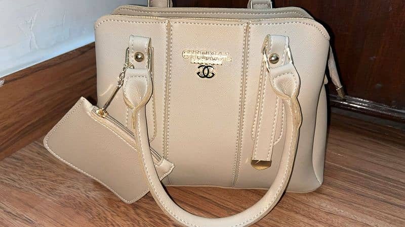 condition is 10/10 urgently sale beige bag with 4 pockets 2