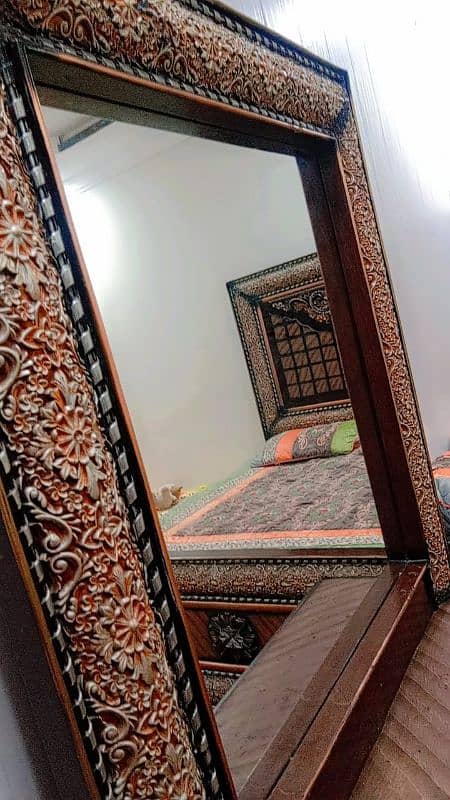 wooden bed with dressing 0