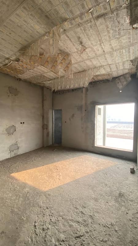 Q Block 10 Marla Main 50 Fit Road Gray Shutter Double Story House For Sale Al Rehman Garden Phase-2 8