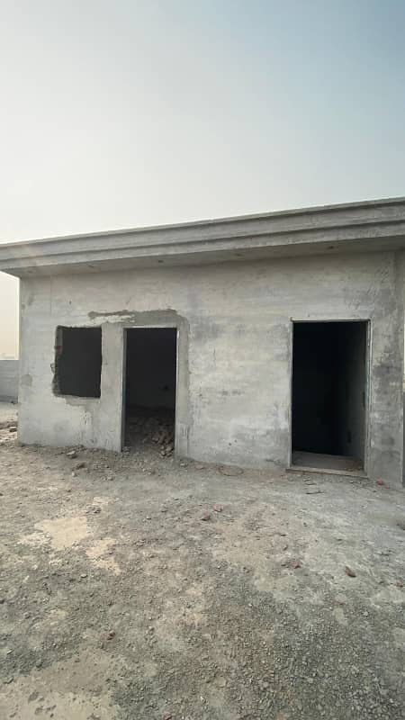 Q Block 10 Marla Main 50 Fit Road Gray Shutter Double Story House For Sale Al Rehman Garden Phase-2 9