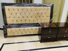 brand new bed with side tables