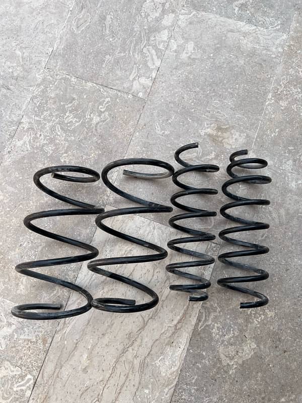 genuine springs for the shocks of toyota corolla altis / gli / xli 0