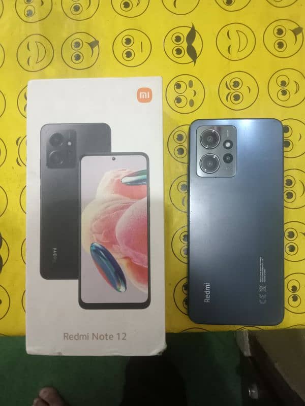 Redmi note 12 with box and charger 2