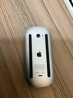 Apple Magic Mouse 3   Modle#: A1657 with books