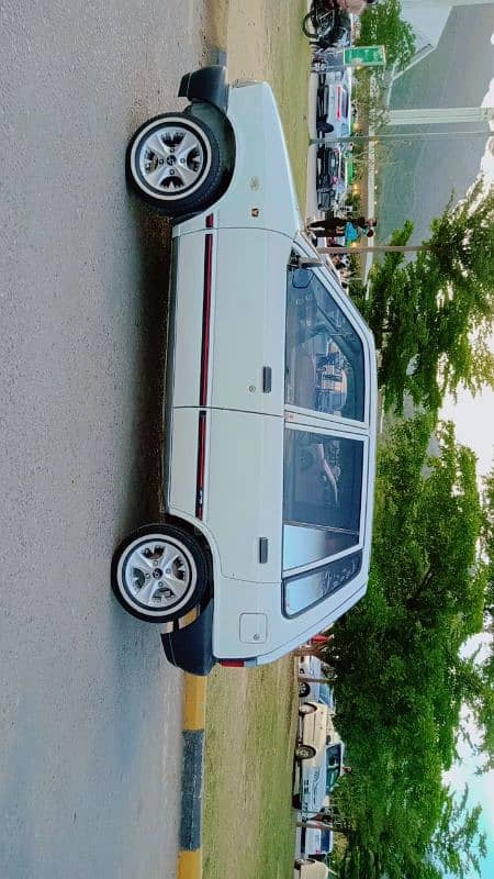 Suzuki Mehran VX 1998 03195704733 is number per rabta 4