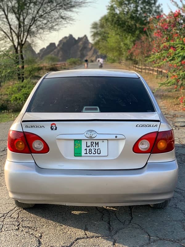 Toyota Corolla SE Saloon manual 2003 model Lahore register 12