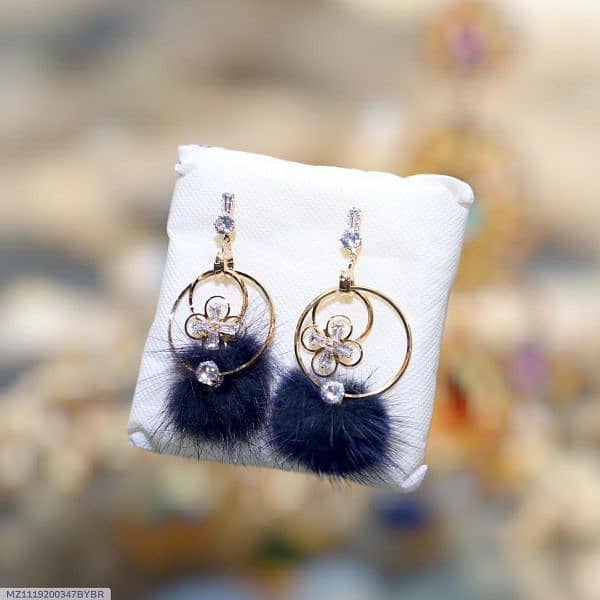 **Product Title:** Elegant Floral Hoop Earrings with Fur Pom-Poms  . 2