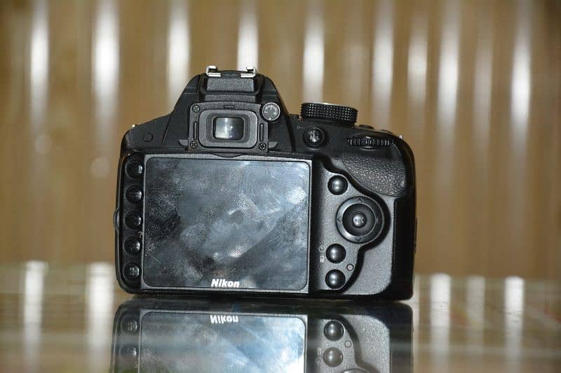 Nikon d3200 with kit lens 7