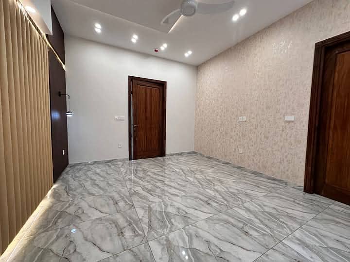 8 Marla 3 badroom upper portion available for rent in dha phase 9 town very good location 13