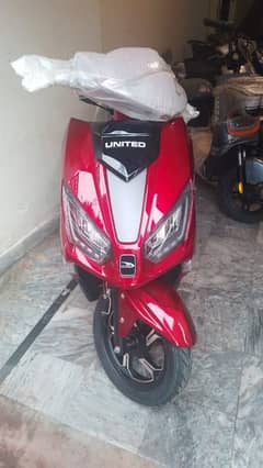 united 100cc self start petrol scooty 2025