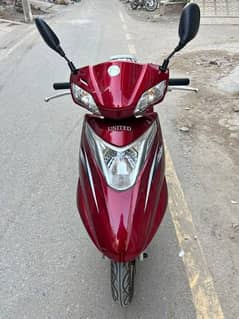 united 100 cc self start scooty petrol