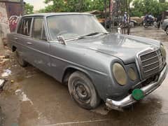 Antique Mercedes 200 D 1976 with petrol engine