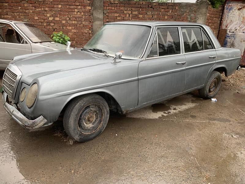 Antique Mercedes 200 D 1976 with petrol engine 1