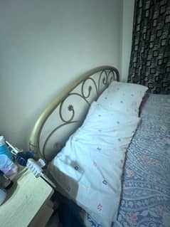 iron bed and dresser