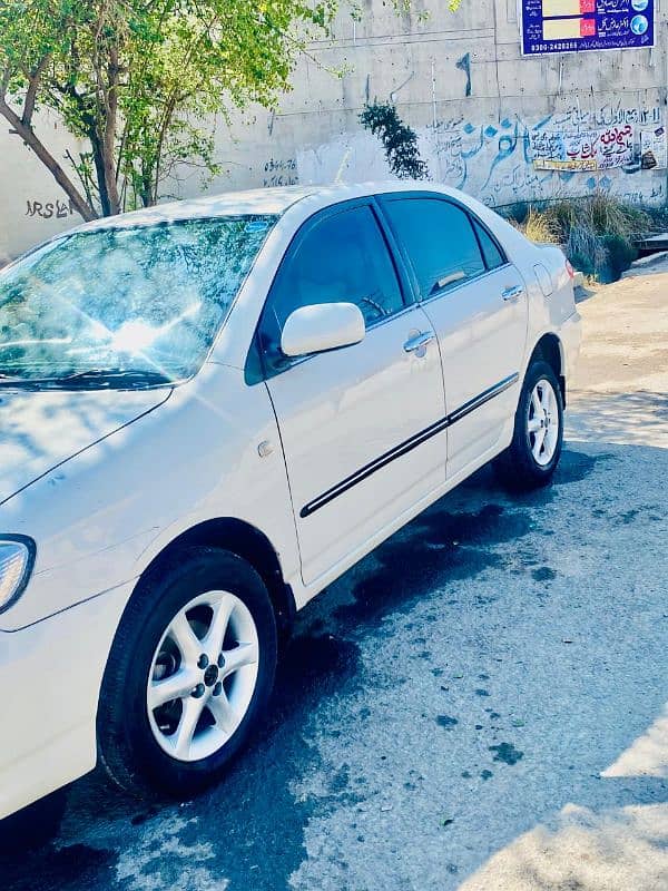 total genuine Toyota Corolla XLI 2006 canvrt tu Gli 8