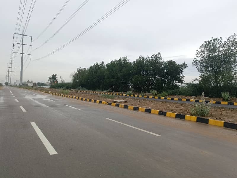 100 sq yard commercial plot for sale on 150 Ft Wide Road in PIR AHMED ZAMAN TOWN 1