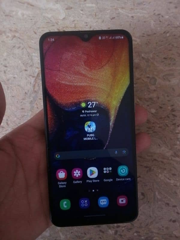 SAMSUNG GALAXY A50 4/128.4000MAHplease contact me WhatsApp(03289951005 4