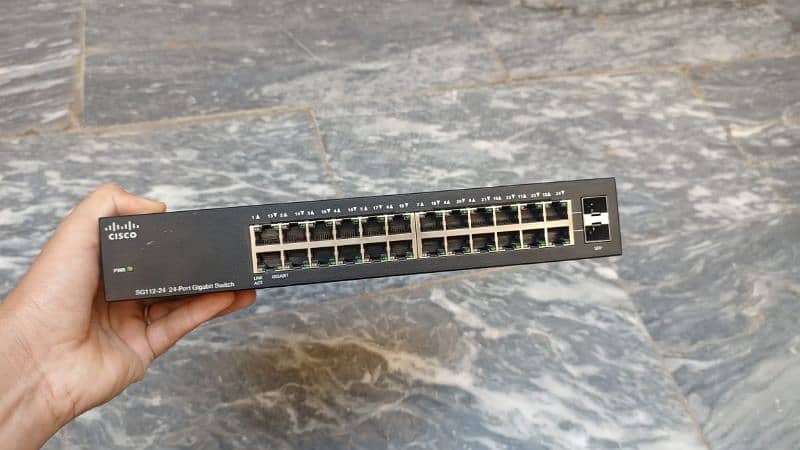 Cisco 24 port and 8 port Switch 0