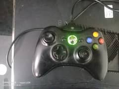 Xbox 360 slim 229gb with jailbreak with 2 controllers and 18 games