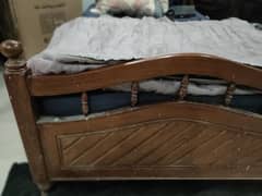 wooden single bed for sale.