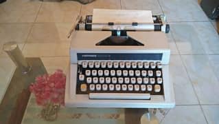 Antique Hermes typewriter