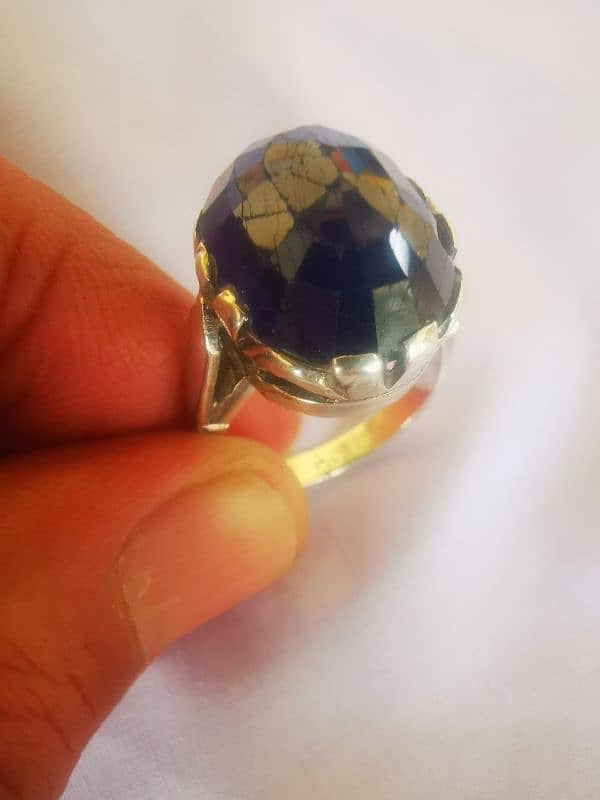 Precious sapphire stone in silver ring 0