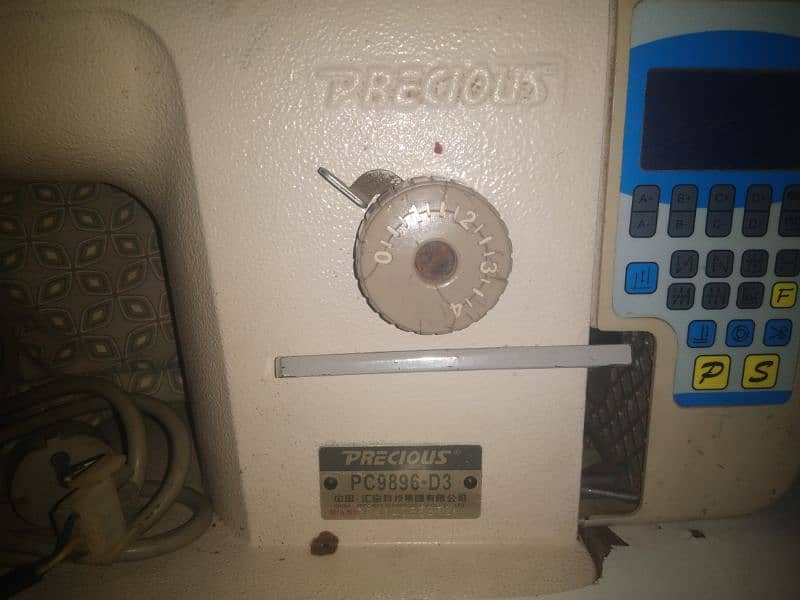 2 sewing machin sel 1 auto,1 manual oragi town 2