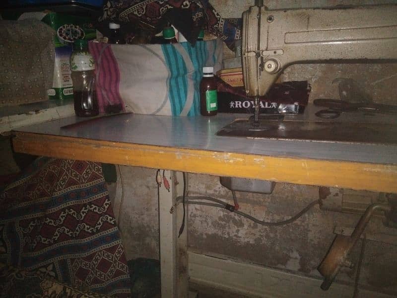 2 sewing machin sel 1 auto,1 manual oragi town 6