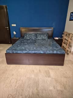 Double bed with dressing and two bedside tables