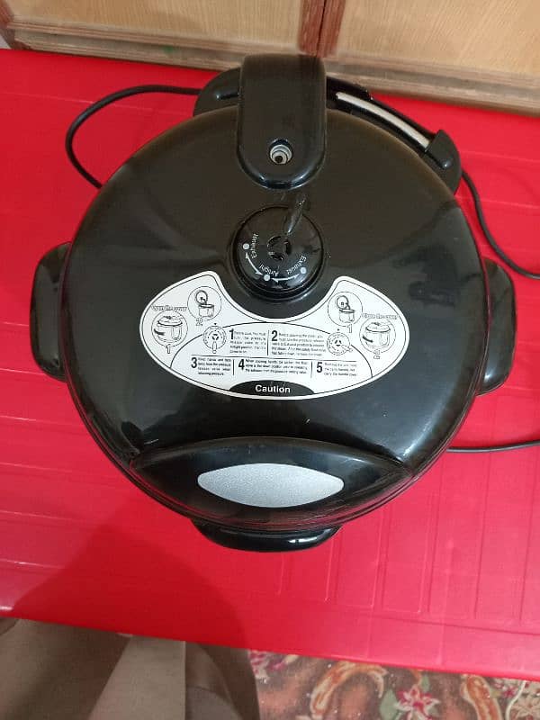 New Wave Multifunctional 2 Litre Electric Pressure Cooker 11