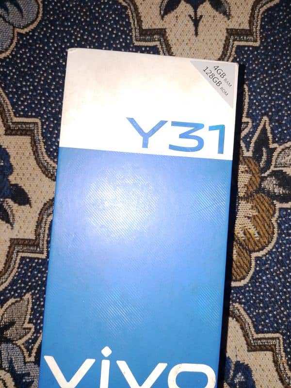 I want sell my Vivo y31. . complete box 03245475040 4