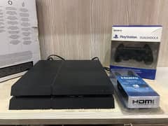 PS4 with Full Pack – 1TB Storage, Excellent Condition