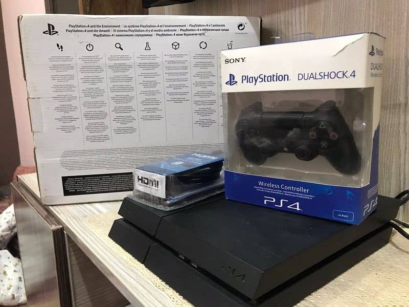 PS4 with Full Pack – 1TB Storage, Excellent Condition 1