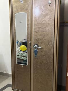 iron cupboard and wooden table