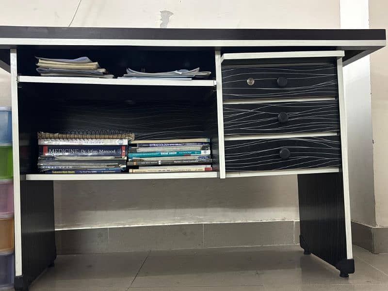 iron cupboard and wooden table 1