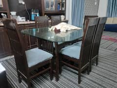 wooden dining table with 6 chairs