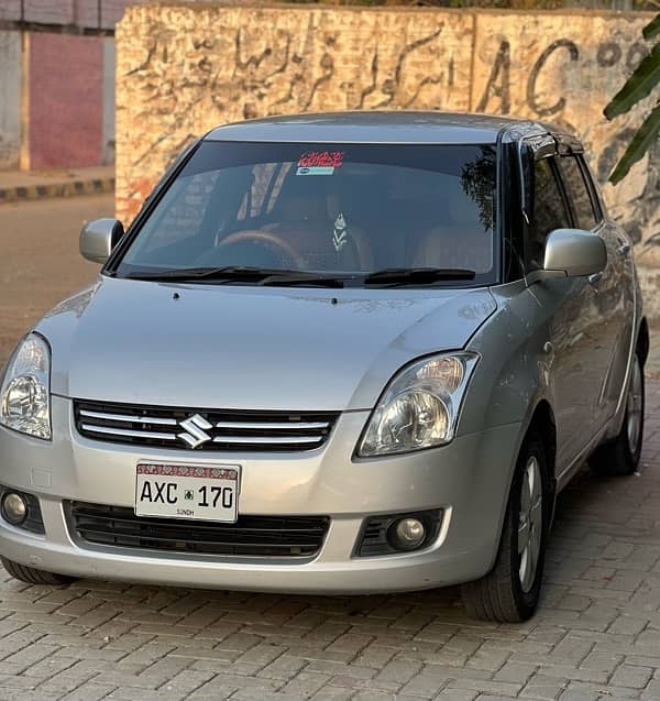 Suzuki Swift DLX 1.3 ABS 2012. Almost Genuine. 4