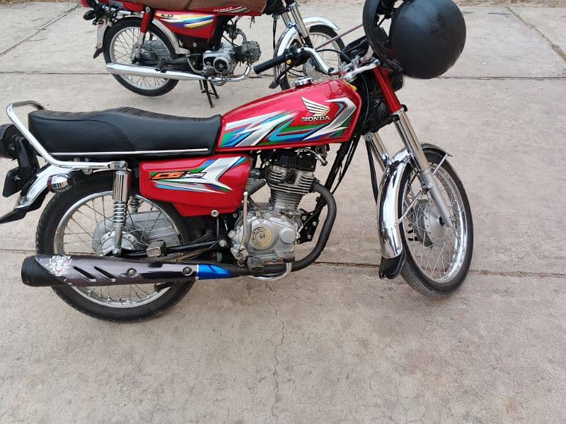 Honda 123 mdl 23isilamabad num laga hova h vip candtion ma h 3