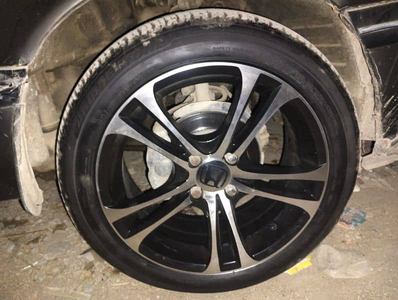 16 inches rims pcd 100*4 with bridgestone tubeless tyres. . 0