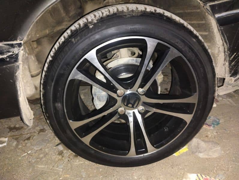 16 inches rims pcd 100*4 with bridgestone tubeless tyres. . 3