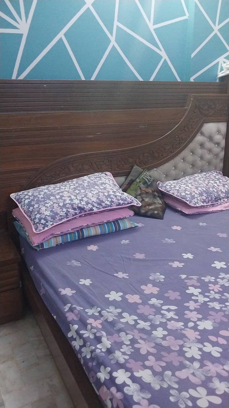 King size bed with two side tables and dressing 2