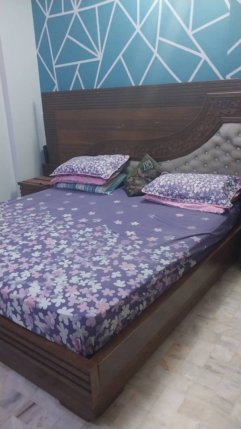 King size bed with two side tables and dressing 6