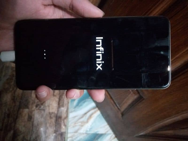 Infinix Hot 40i Faulty Mobile is on sale for Parts 3